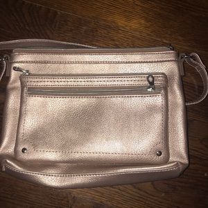 Relic cross body purse. Metallic pink.